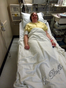 Lizz in her awesome medical gown. Add the bandage on the right and that's about how she looked when it was all done.